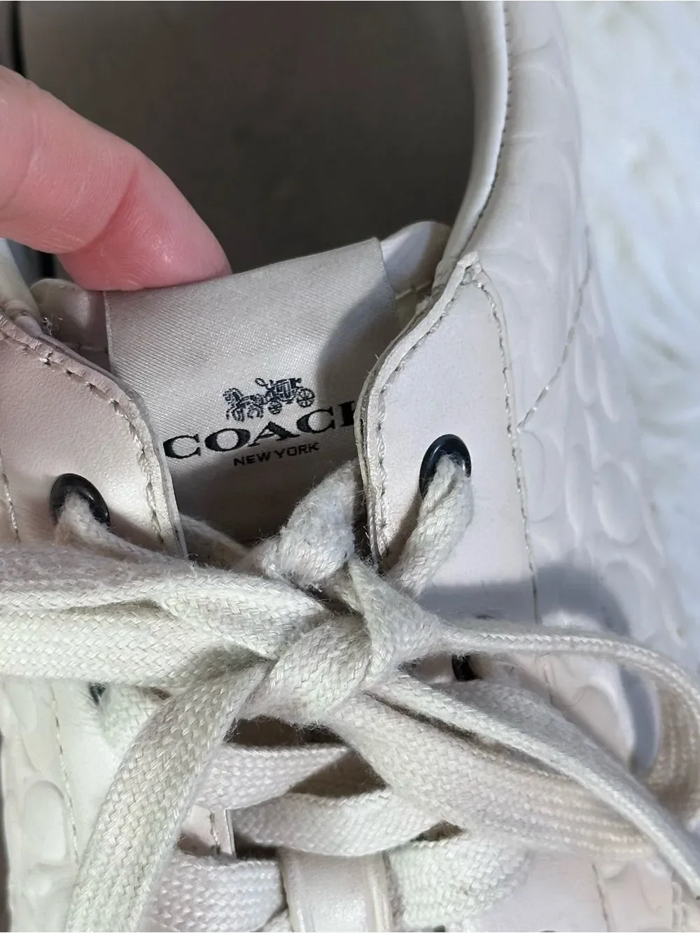 Coach Women's cream leather Signature Embossed Sneakers